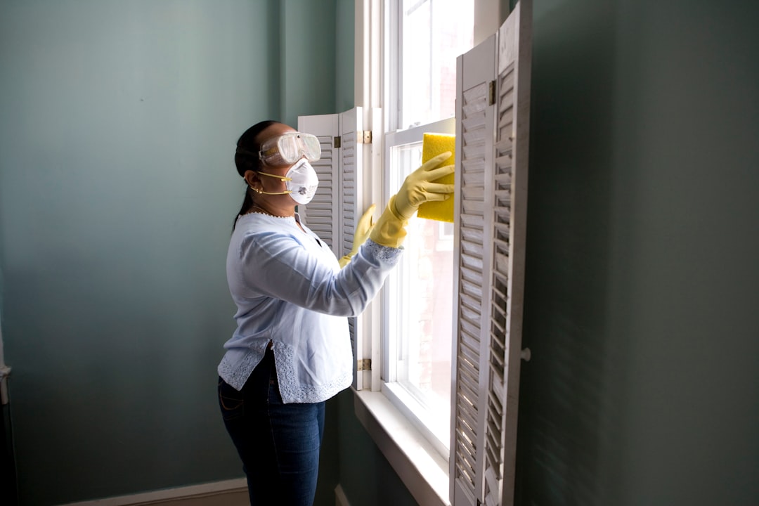 services-img When renovating a home, you should use a damp sponge or cloth to clean dust collected on a window sill, as the dust may contain asbestos or lead-based paint. Home maintenance is an ongoing process for any homeowner, and here we see an African- American woman who’d taken a damp sponge to her window’s frame, in order to remove accumulated dust particulates. Note how the homeowner had donned a pair of waterproof gloves, a facemask, and a pair of goggles, prior to beginning this task.
